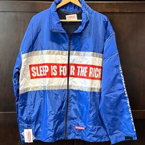 Sleep is for the Rich BlueJacket w Reflective material. 3 zippered pockets